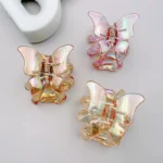 Imported Butterfly Plastic Catcher of Metallic Shine with Large Shark Tooth